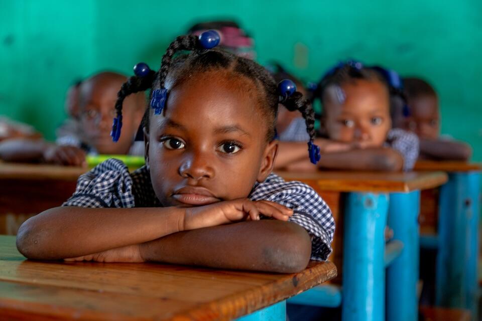 On March 1, 2023, students sit in class during a distribution of school kits by UNICEF at the National School of Dame Marie in Grand Anse Department, Haiti.